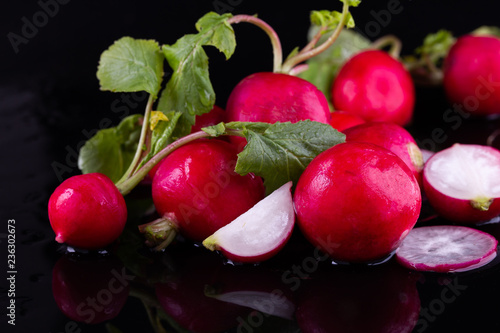 Red fresh radish on wooden