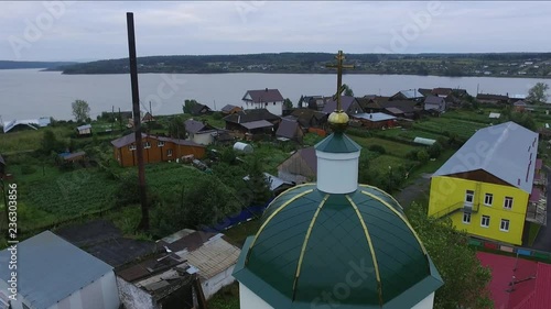 Construction of a new wooden Church Staroutkinsk Russia photo