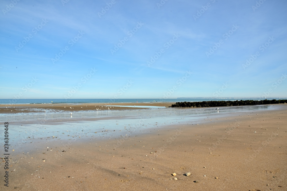 sand, rocks and sea