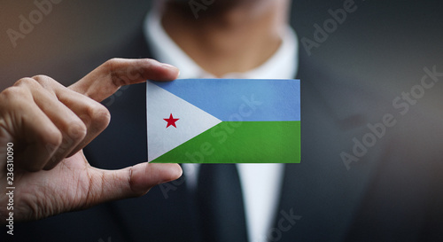 Businessman Holding Card of Djibouti Flag