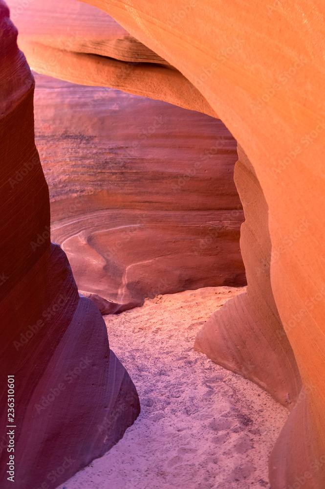 Passage through the Navajo sandstone in Cardiac Canyon, Page, Arizona Passage through the Navajo sandstone in Cardiac Canyon, Page, Arizona