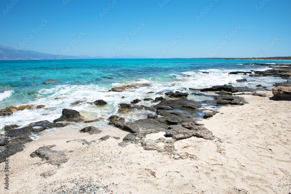 Beautiful beach with crystal clear sea and blue sky
