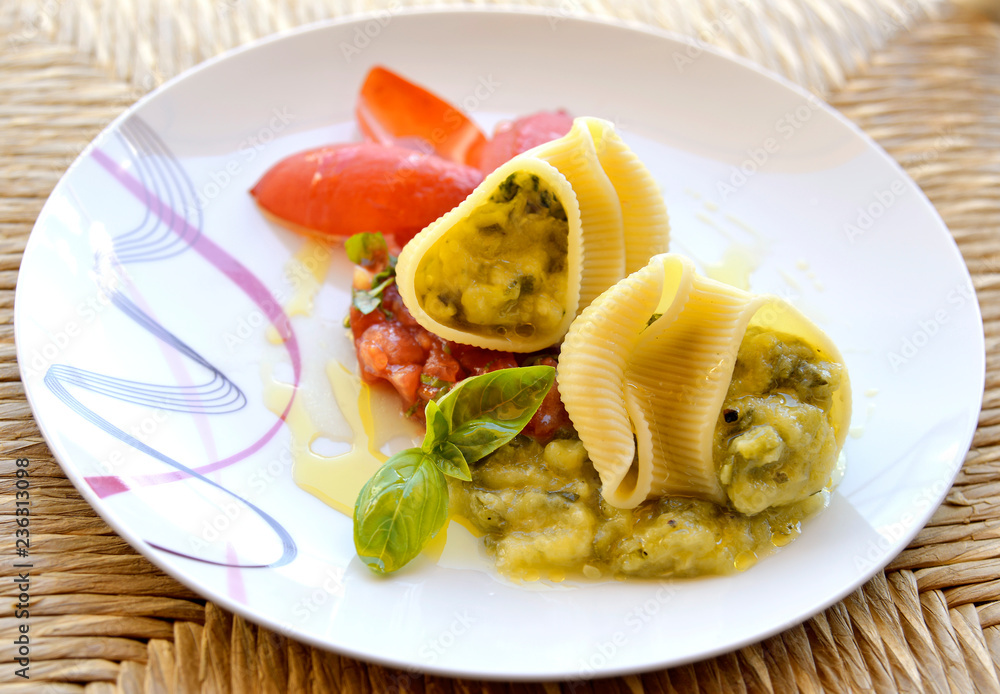 Plate of stuffed pasta with cream of zucchini Plate of stuffed pasta with cream of zucchini