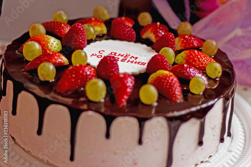 Loaf cake with chocolate Syrup with strawberry over