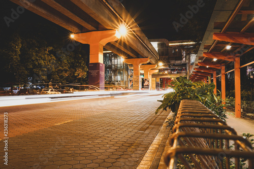 Photography KUALA LUMPUR, MALAYSIA - NOVEMBER 18 2018 : Night traffic light trail at Bandar Sunway in front of the Sunway City
