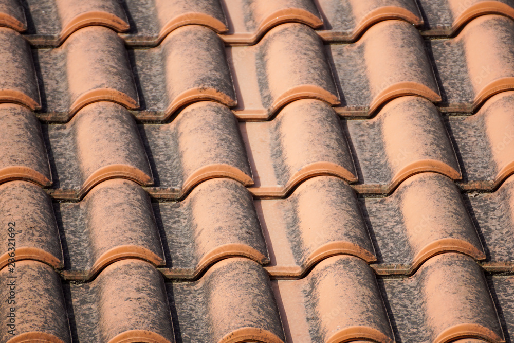 orange roof and blue sky background close up orange roof and blue sky background close up