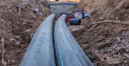 sewer pipes with water are laid underground