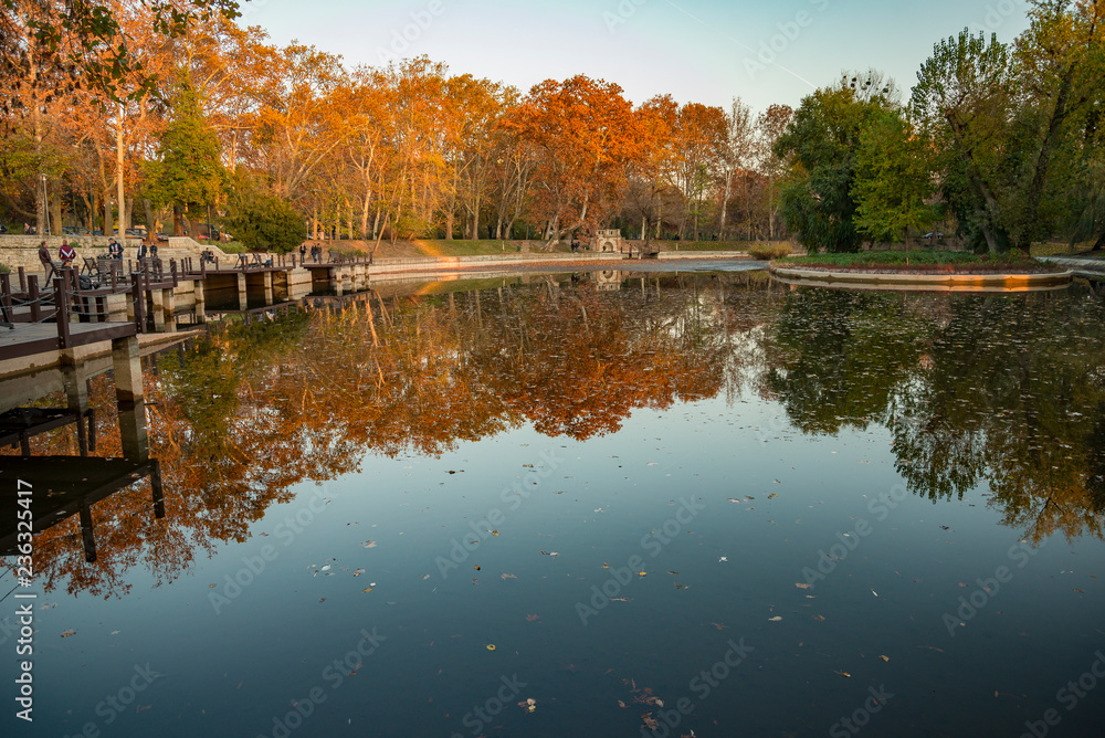 Obraz premium Hungary Budapest 2018: Vajdahunyad castle reflection on Városliget lake in Budapest autumn