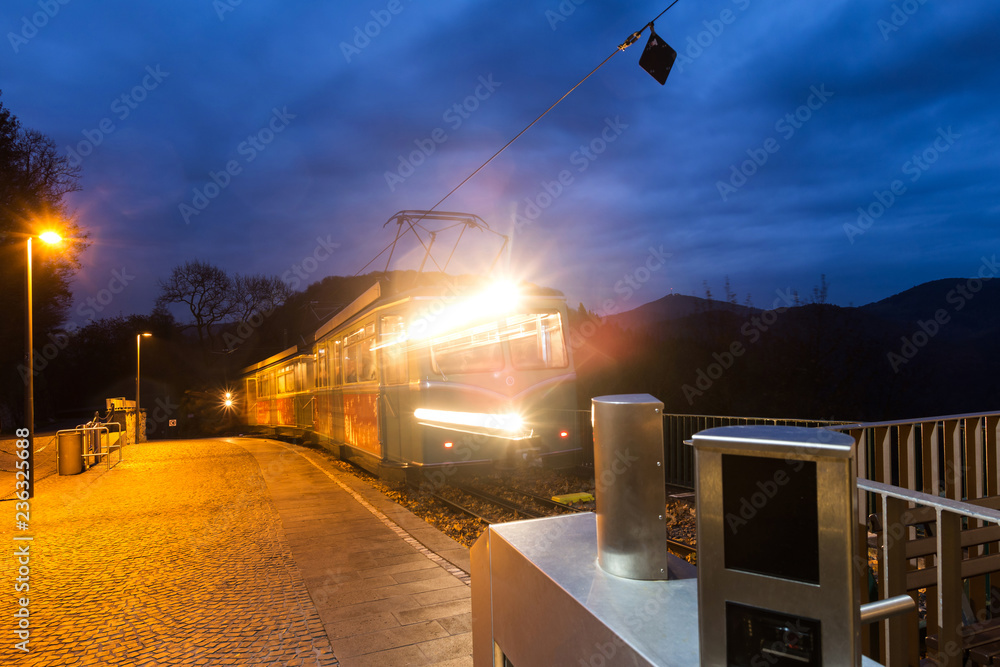 Obraz premium rack railway dragons rock koenigswinter germany in the evening