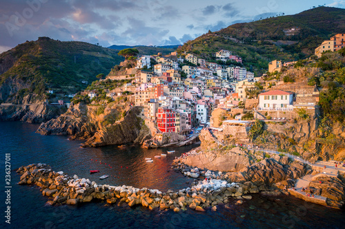 Riomaggiore of Cinque Terre, Italy - Traditional fishing village in La Spezia, situate in coastline of Liguria of Italy. Riomaggiore is one of the five Cinque Terre travel attractions.