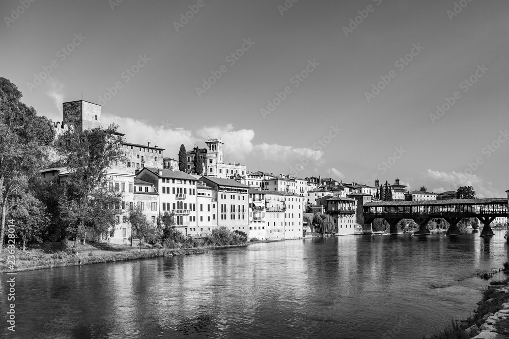 old wooden bridge spans the river brenta at the romantic village Basano del Grappa