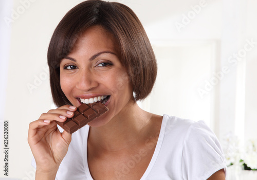 WOMAN EATING CHOCOLATE