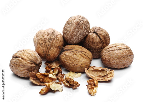 Cracked walnut, isolated on white background