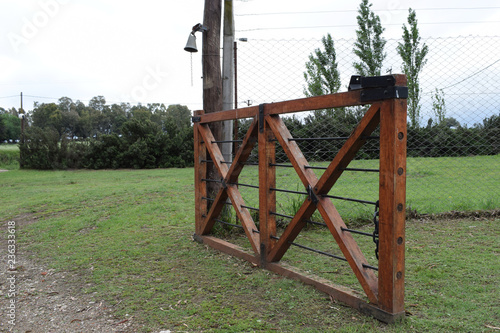 open iron gate at the entrance on the ranch