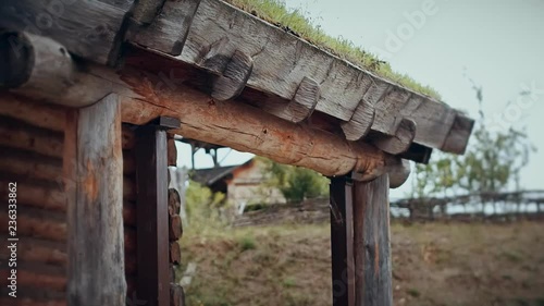 An ancient Slavic pagan city built of wood, excellent scenery for a historical film, old wooden churches and houses, an orthodox cross, summer time, no people in the frame, old Kiev photo