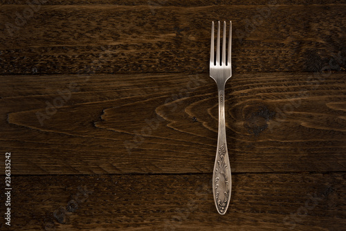 Old cutlery. Top view On a wooden background, Copy space.