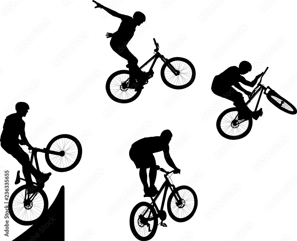 Fototapeta premium silhouette of male doing bike trick