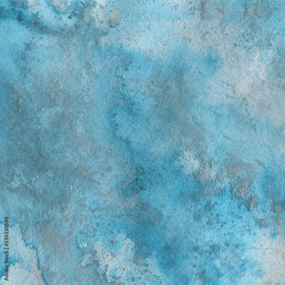 Obraz premium Blue watercolor winter texture with abstract washes and brush strokes on the white paper background. Frozen look.