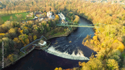 Aerial image of the David Livingstone memorial bridge and Blantyre Weir on the River Clyde.