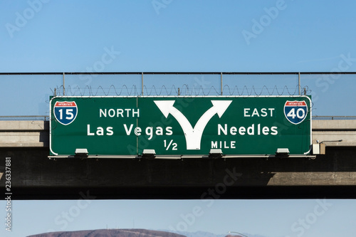 Las Vegas Interstate 15 and 40 freeway arrow sign in the Mojave desert near Barstow, California. 