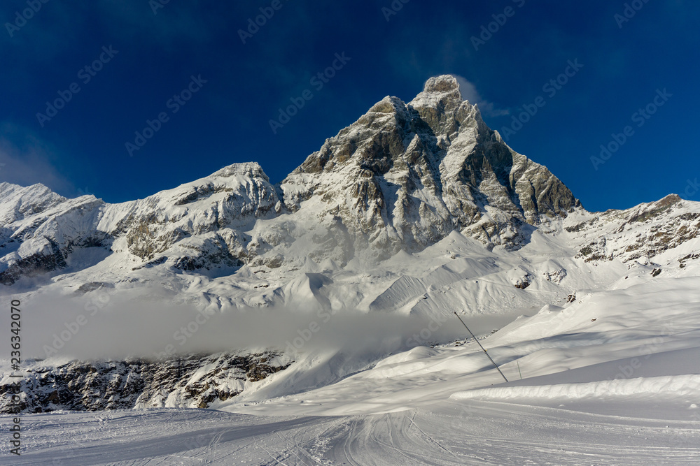 Landscape of one of the highest mountains in Italy, the Matterhorn on a cold day of blue sky