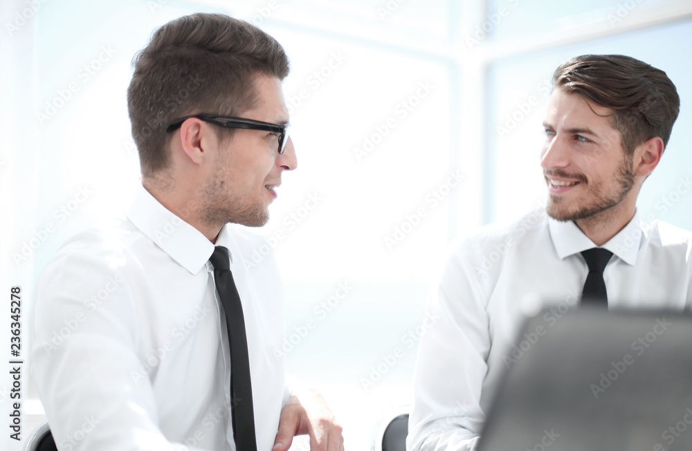 Young professional businessman using modern laptop Young professional businessman using modern laptop
