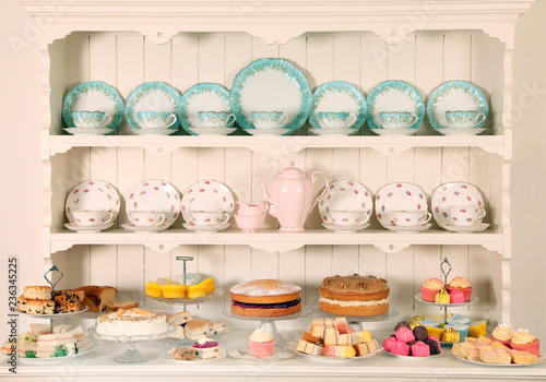 VINTAGE CHINA TEACUPS WITH CAKES photo