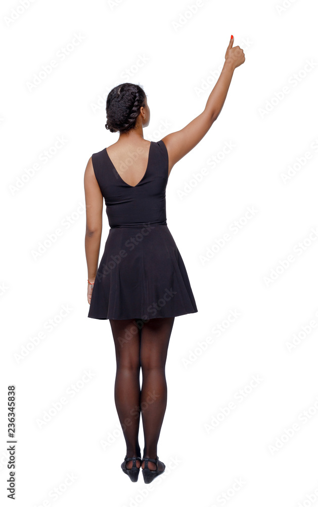 Back view of a black woman showing thumb up. Back view of a black woman showing thumb up.