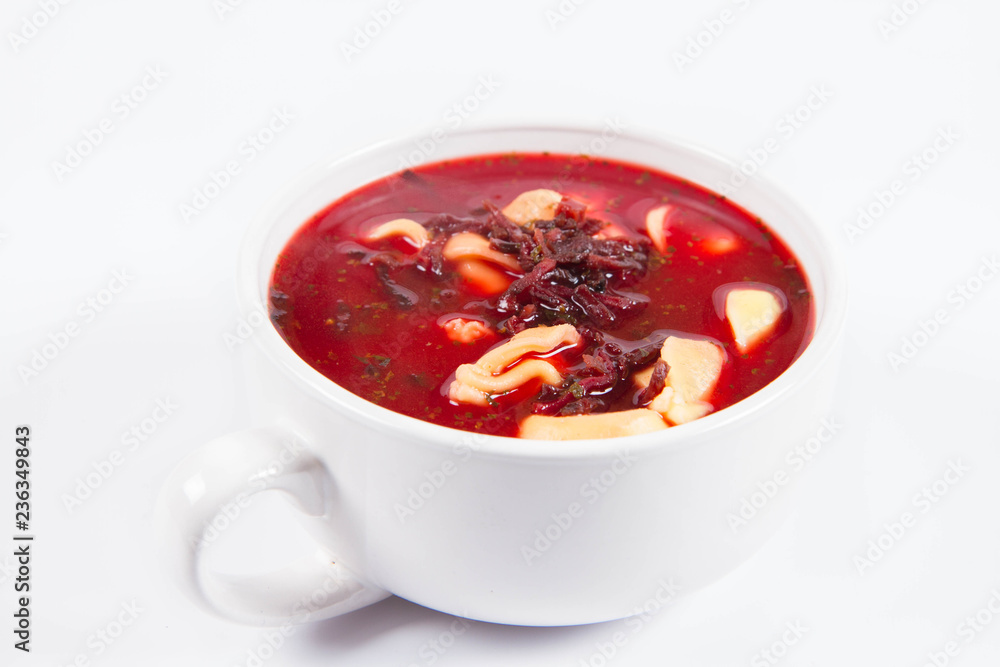 Traditional polish Christmas Eve dish: red borscht with uszka (a mushroom filled kind of dumplings) Traditional polish Christmas Eve dish: red borscht with uszka (a mushroom filled kind of dumplings)