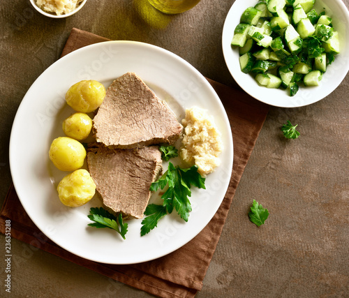 Boiled beef with potatoes and horseradish