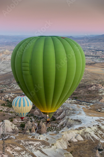 Cappadocia hot air balloon green early sunrise 