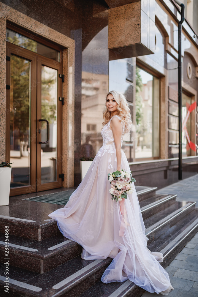 Photo shoot of the newlyweds on the street. Kirov Avenue. Saratov.
