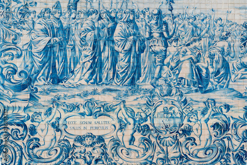 The side facade of Carmo Church is lined with a large panel of tiles, depicting scenes alluding to the foundation of the Carmelite Order