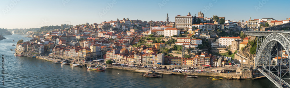 Panorama of the historical part of Oporto, the district Ribeira and the famous Dom Luis I Bridge, seen from the city Vila Nova de Gaia