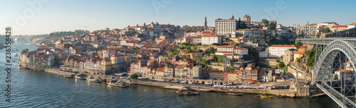 Panorama of the historical part of Oporto, the district Ribeira and the famous Dom Luis I Bridge, seen from the city Vila Nova de Gaia