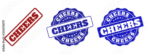 CHEERS grunge stamp seals in red and blue colors. Vector CHEERS labels with dirty texture. Graphic elements are rounded rectangles, rosettes, circles and text labels.