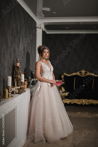 Beautiful model in a modern wedding dress.