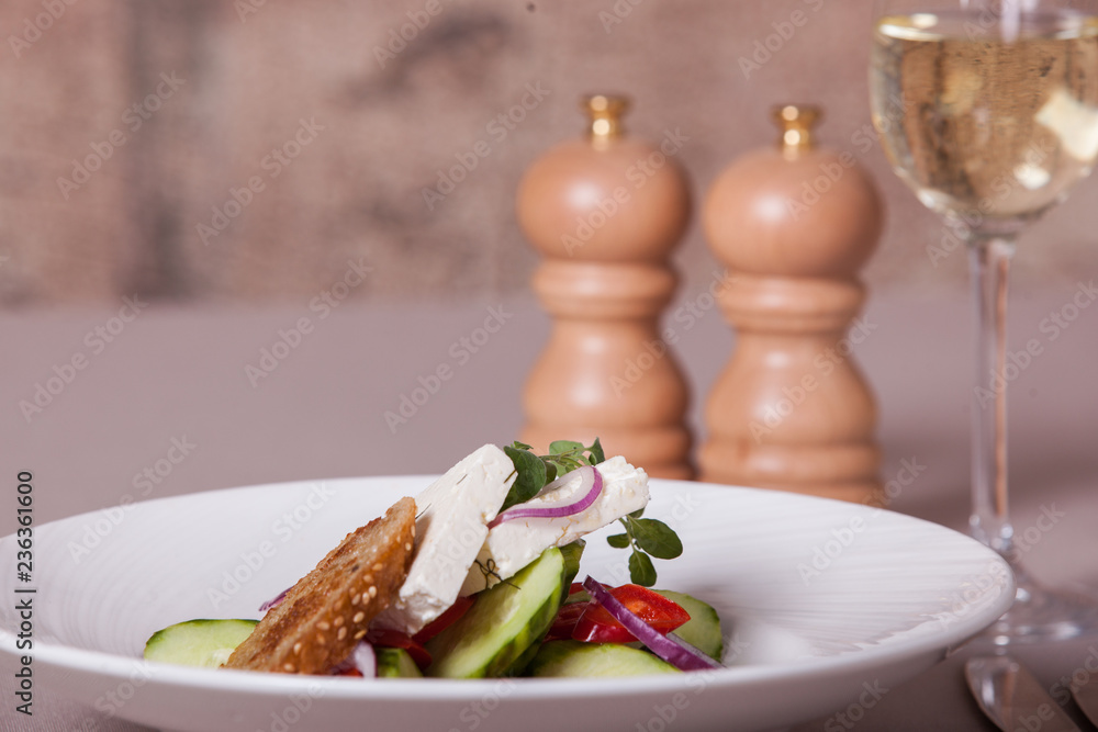 Greek salad with white wine