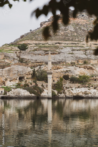 Amazing view of Savasan Village in Turkey located in Halfeti, Sanliurfa Province. Partially submerged and abandoned due to a dam project on Euphrates river. Old town in Halfeti, Turkey lost underwater photo