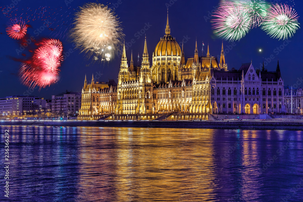 Parliament in Budapest with firework, celebration of the New Year, Hungary
