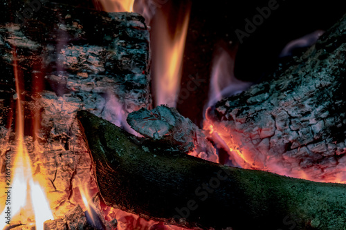 burning oak wood home fireplace