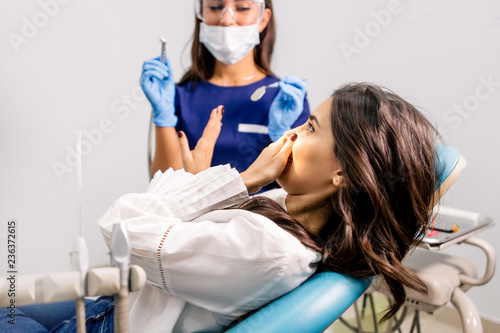 Girl on a visit to the dental clinic