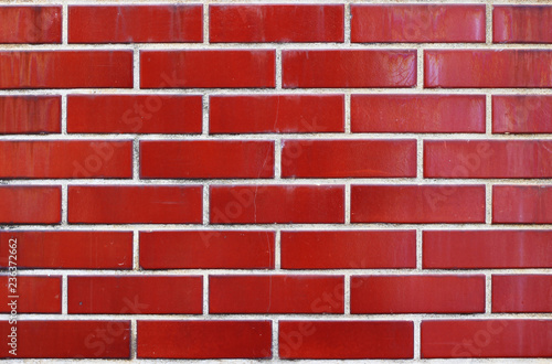 Red brick wall texture background, copy space.