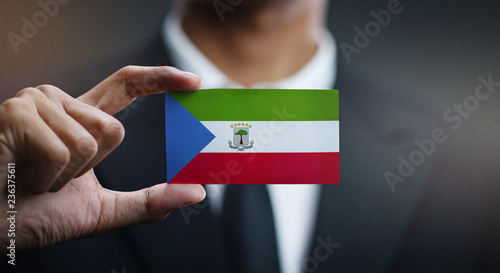 Businessman Holding Card of Equatorial Guinea Flag