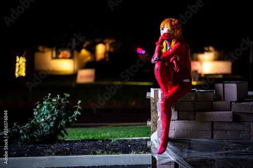 Young attractive girl dressed up at night photo