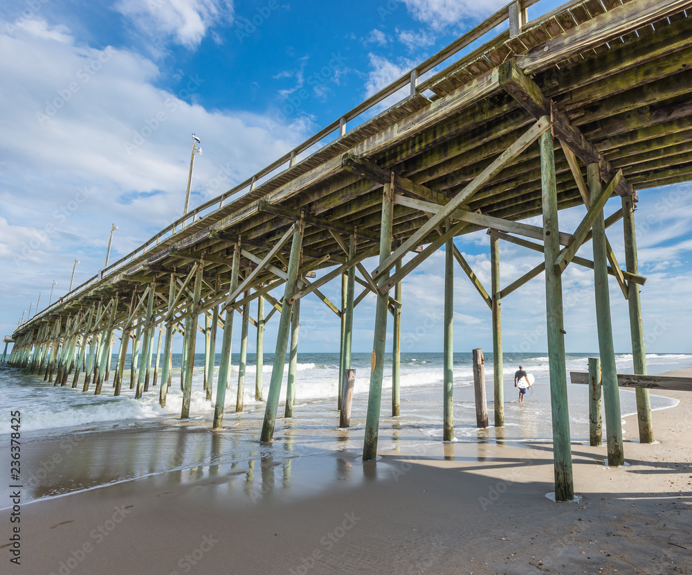Looking beyond a pier at Carolina Beach, North Carolina, USA Looking beyond a pier at Carolina Beach, North Carolina, USA