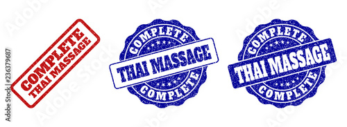 COMPLETE THAI MASSAGE grunge stamp seals in red and blue colors. Vector COMPLETE THAI MASSAGE signs with grunge surface. Graphic elements are rounded rectangles, rosettes, circles and text captions.