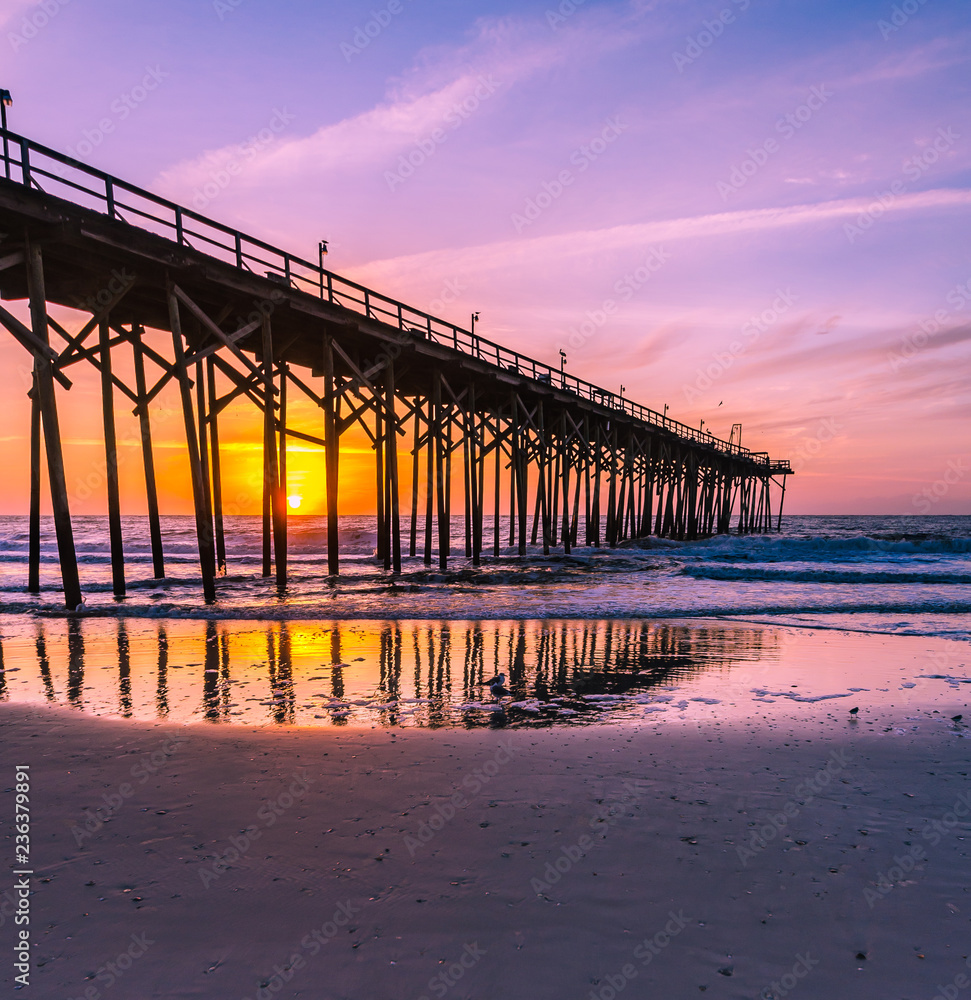 pier at sunset in Carolina Beach, North Carolina, USA