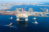 Drilling platform in the port. Towing of the oil platform