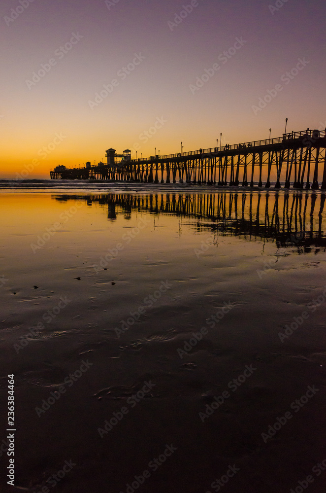 Pier & colorful sunset in Oceanside, California, USA